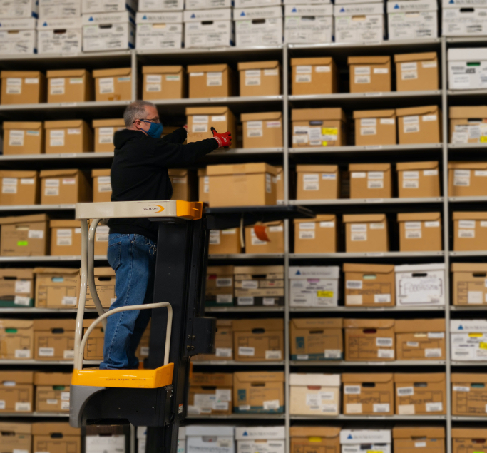 Man in a document storage warehouse